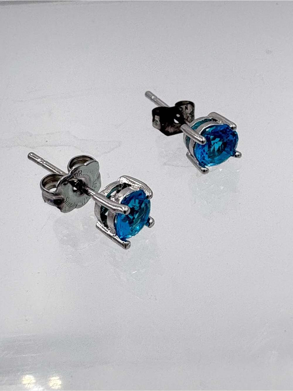 Classic Blue Topaz Round Stud Earrings - Silver Tone - Picture 3 of 16